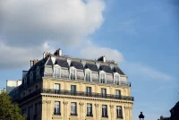 Apartment facade in typical French architectural style