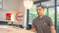 A Williams & Yates staff member in a branded polo shirt packing a box, with FIDI and FAIM accreditation logos overlaid